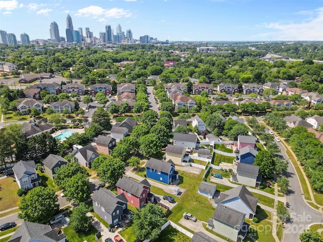 aerial perspective of suburban area with a skyline view