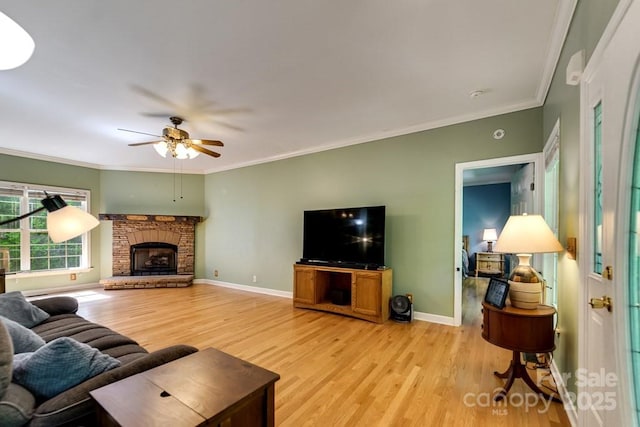 910 Hannah Mountain Rd, Otto, NC 28763 - living area with ceiling fan, ornamental molding, baseboards, and light wood-type flooring
