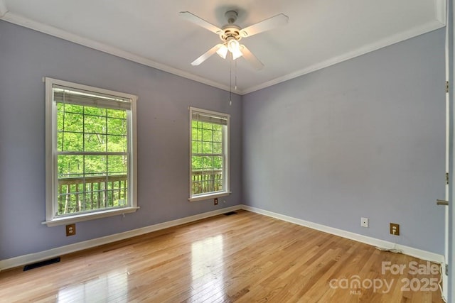 910 Hannah Mountain Rd, Otto, NC 28763 - unfurnished room featuring wood finished floors, visible vents, crown molding, a ceiling fan, and baseboards