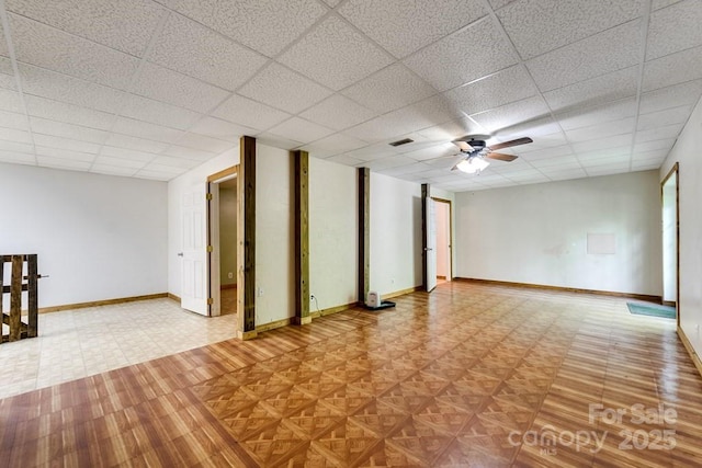 910 Hannah Mountain Rd, Otto, NC 28763 - interior space with a drop ceiling, baseboards, visible vents, and ceiling fan