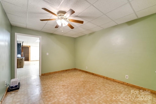 910 Hannah Mountain Rd, Otto, NC 28763 - unfurnished room featuring light floors, a drop ceiling, and ceiling fan
