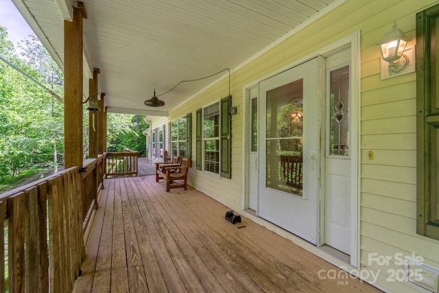 910 Hannah Mountain Rd, Otto, NC 28763 - wooden deck with a porch
