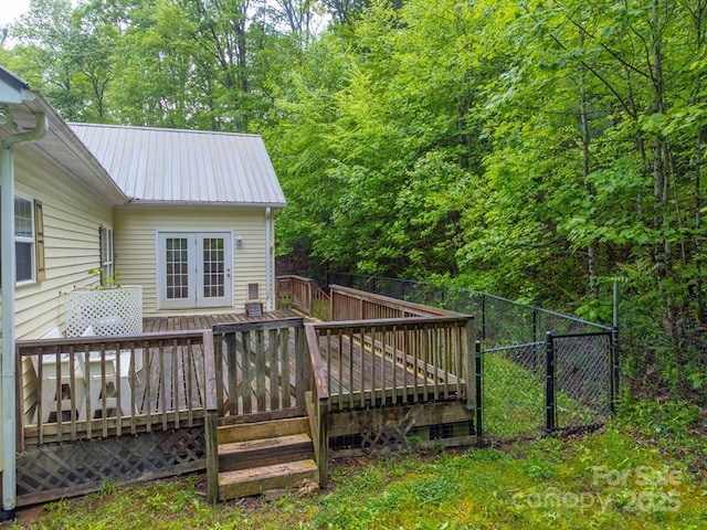 910 Hannah Mountain Rd, Otto, NC 28763 - wooden terrace featuring french doors and a fenced backyard