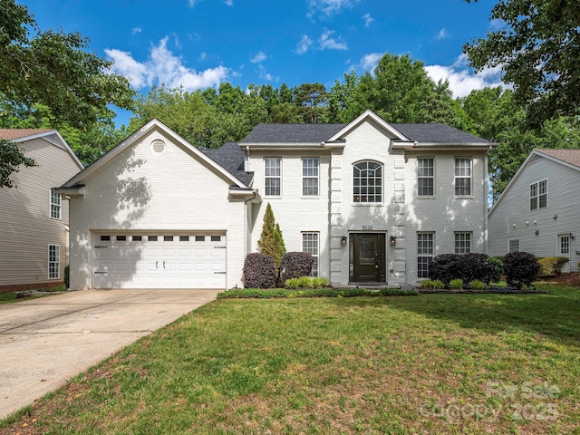 3626 Cole Mill Rd, Charlotte, NC 28270 - colonial home with a garage, driveway, a front lawn, and brick siding