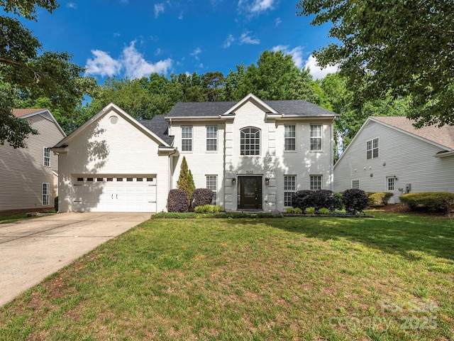 3626 Cole Mill Rd, Charlotte, NC 28270 - colonial home with a garage, concrete driveway, and a front lawn