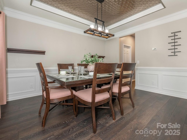 3626 Cole Mill Rd, Charlotte, NC 28270 - dining space featuring a tray ceiling, ornamental molding, dark wood-type flooring, wainscoting, and a decorative wall
