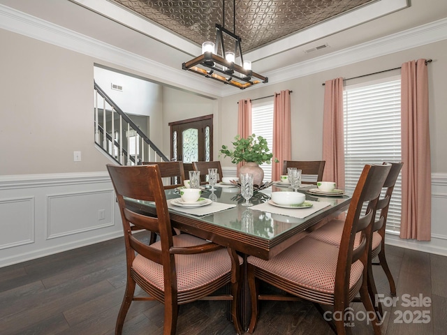 3626 Cole Mill Rd, Charlotte, NC 28270 - dining area featuring a chandelier, a wainscoted wall, a tray ceiling, dark wood-style floors, and stairs