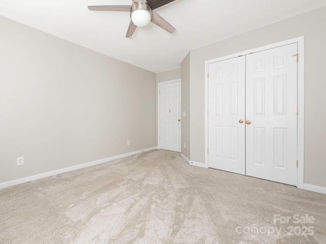3626 Cole Mill Rd, Charlotte, NC 28270 - unfurnished bedroom featuring light carpet, baseboards, a closet, and ceiling fan