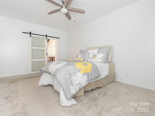3626 Cole Mill Rd, Charlotte, NC 28270 - bedroom with a barn door, light colored carpet, baseboards, and ceiling fan