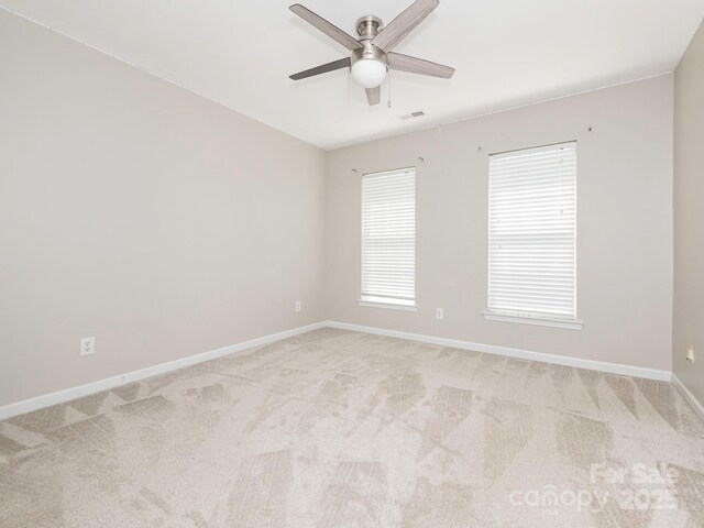 3626 Cole Mill Rd, Charlotte, NC 28270 - unfurnished room featuring a ceiling fan, light colored carpet, baseboards, and healthy amount of natural light
