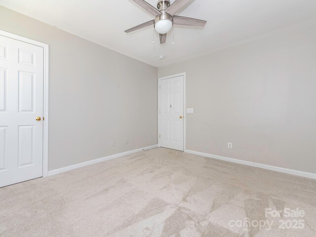 3626 Cole Mill Rd, Charlotte, NC 28270 - spare room with a ceiling fan, light carpet, and baseboards