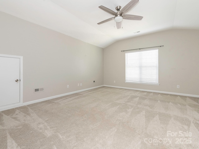 3626 Cole Mill Rd, Charlotte, NC 28270 - empty room featuring vaulted ceiling, a ceiling fan, light carpet, and baseboards