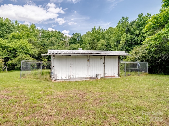 view of shed featuring a wooded view