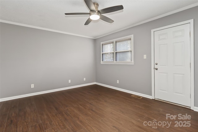1637 Sumner Dr, Rock Hill, SC 29732 - unfurnished room featuring a ceiling fan, baseboards, dark wood-style flooring, ornamental molding, and visible vents