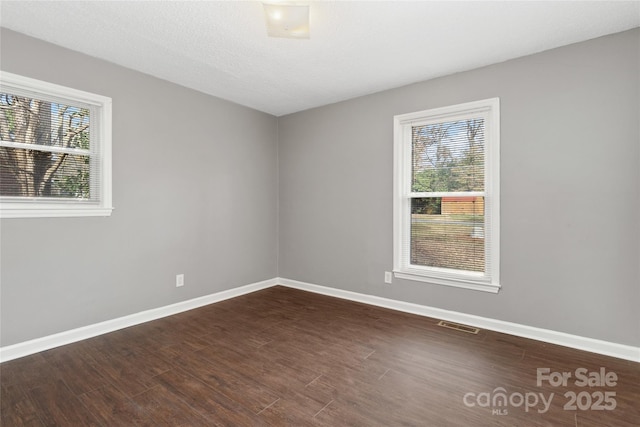 1637 Sumner Dr, Rock Hill, SC 29732 - empty room featuring baseboards, visible vents, and wood finished floors