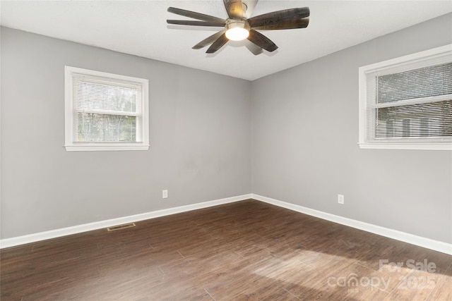 1637 Sumner Dr, Rock Hill, SC 29732 - empty room featuring dark wood-style floors, baseboards, a ceiling fan, and visible vents