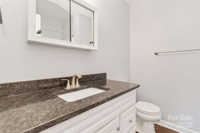 1637 Sumner Dr, Rock Hill, SC 29732 - bathroom with toilet, vanity, and wood finished floors