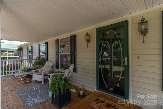 wooden deck with covered porch