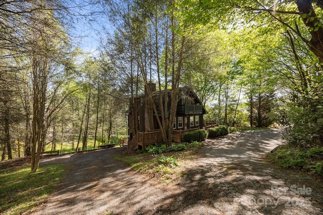 25 Alpine Way, Clyde, NC 28721 - view of dirt / gravel road featuring a view of trees