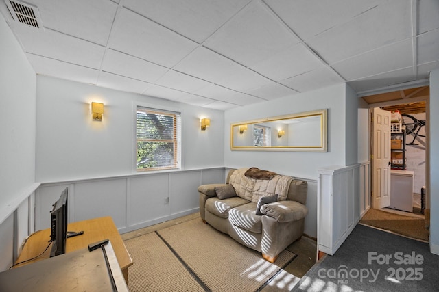 25 Alpine Way, Clyde, NC 28721 - carpeted living area with a drop ceiling and wainscoting