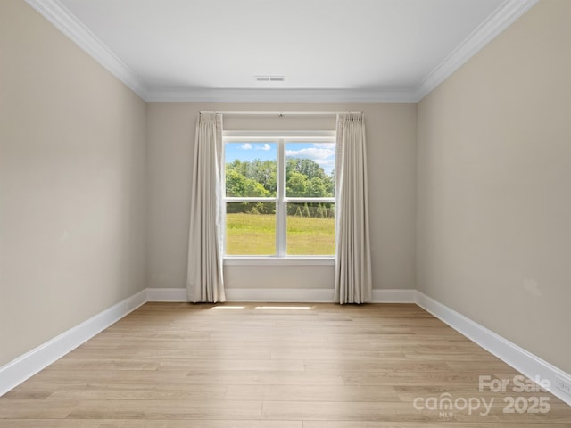 709 Cavesson Way, Monroe, NC 28110 - unfurnished room featuring ornamental molding and light wood finished floors
