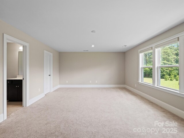 709 Cavesson Way, Monroe, NC 28110 - empty room with light colored carpet and plenty of natural light