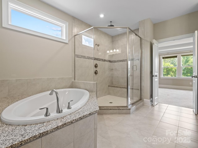 709 Cavesson Way, Monroe, NC 28110 - bathroom with a garden tub, a stall shower, tile patterned floors, and recessed lighting