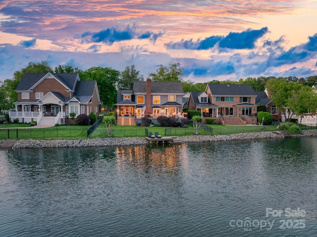 water view featuring a fenced backyard
