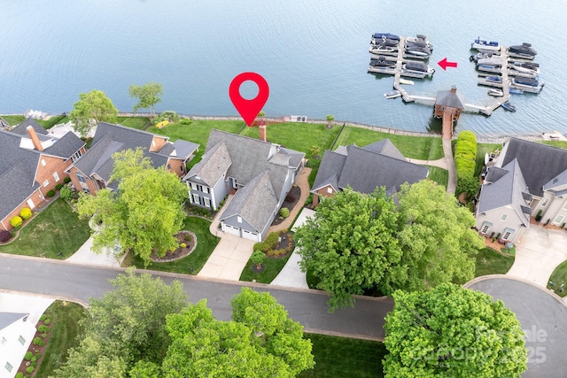 aerial view featuring a water view and a residential view