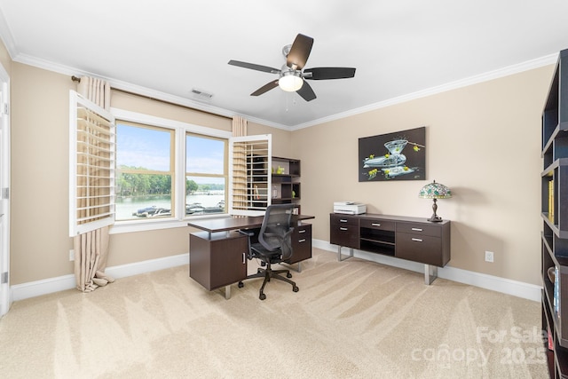 office area featuring crown molding, baseboards, a ceiling fan, and visible vents