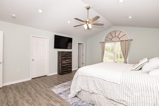 bedroom featuring wood finished floors, recessed lighting, vaulted ceiling, a ceiling fan, and baseboards