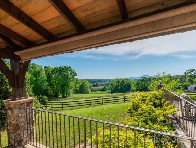 balcony featuring a rural view