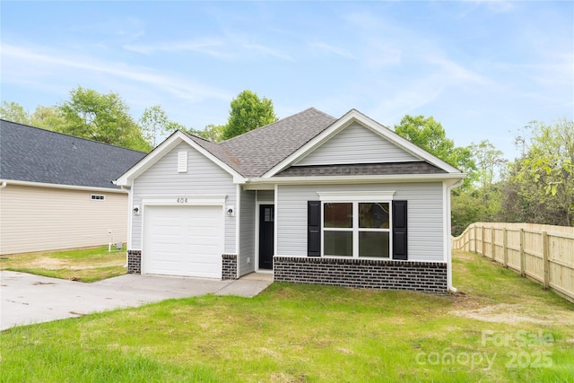 401 Groves St, Lowell, NC 28098 - view of front of house featuring brick siding, an attached garage, concrete driveway, and a shingled roof