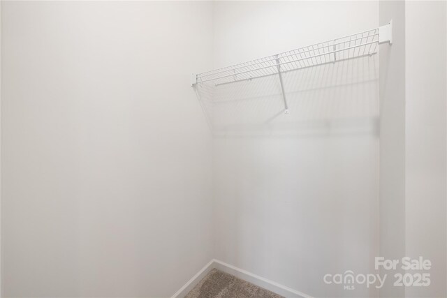 401 Groves St, Lowell, NC 28098 - walk in closet featuring carpet