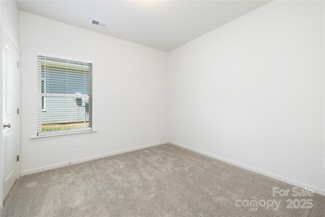 401 Groves St, Lowell, NC 28098 - carpeted spare room featuring baseboards