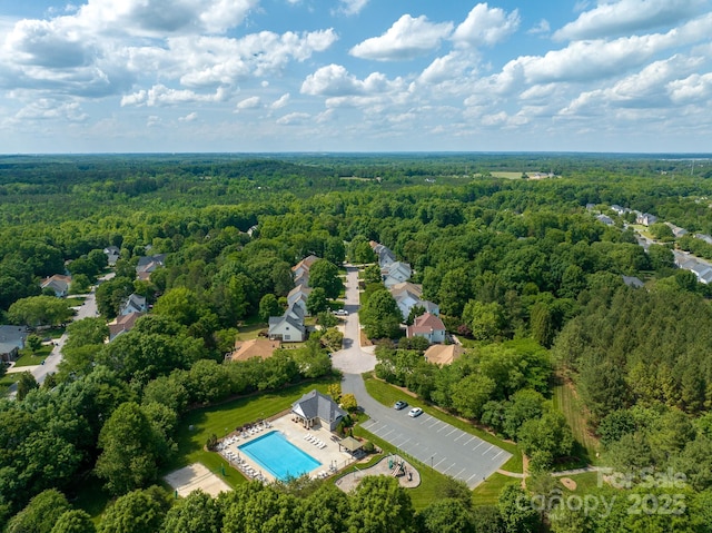 1465 Porters Ct, Concord, NC 28025 - bird's eye view of a heavily wooded area and a pool area