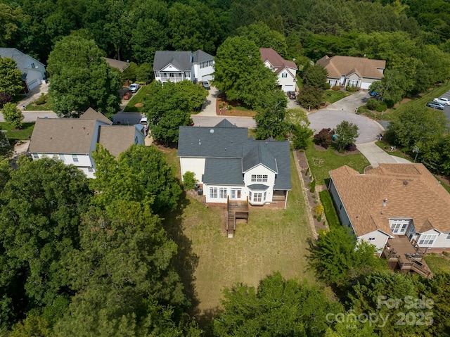 1465 Porters Ct, Concord, NC 28025 - aerial perspective of suburban area featuring a forest