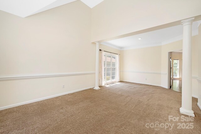 1465 Porters Ct, Concord, NC 28025 - unfurnished room featuring decorative columns, carpet floors, healthy amount of natural light, crown molding, and vaulted ceiling