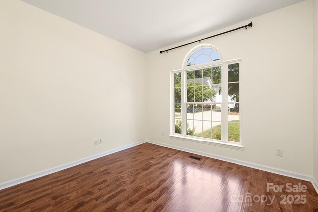 1465 Porters Ct, Concord, NC 28025 - unfurnished room with dark wood-style floors and baseboards