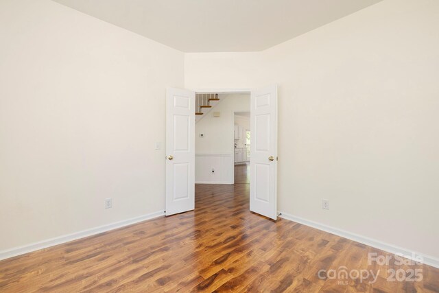 1465 Porters Ct, Concord, NC 28025 - empty room with wood finished floors and baseboards