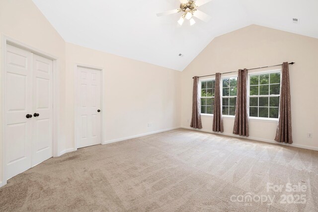1465 Porters Ct, Concord, NC 28025 - carpeted spare room featuring lofted ceiling, ceiling fan, and baseboards
