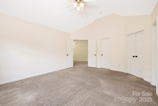1465 Porters Ct, Concord, NC 28025 - unfurnished bedroom with carpet, baseboards, multiple closets, a ceiling fan, and high vaulted ceiling