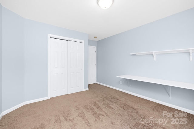 1465 Porters Ct, Concord, NC 28025 - unfurnished bedroom featuring carpet floors, a closet, and baseboards