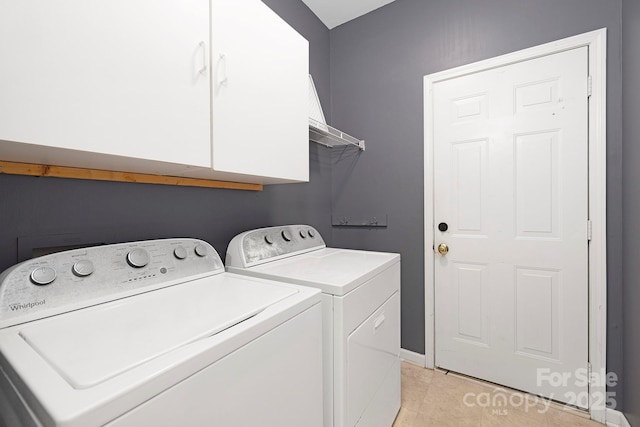 1465 Porters Ct, Concord, NC 28025 - washroom with cabinet space, independent washer and dryer, light tile patterned floors, and baseboards