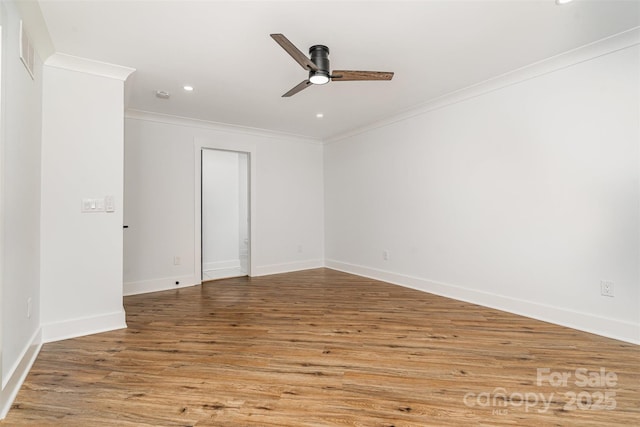 2224 Highland St, Charlotte, NC 28208 - empty room with ceiling fan, ornamental molding, wood finished floors, recessed lighting, and baseboards