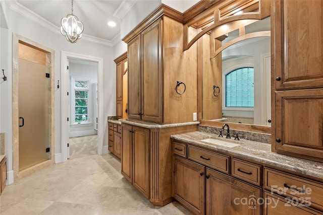 full bath with ornamental molding, a shower stall, vanity, a chandelier, and recessed lighting