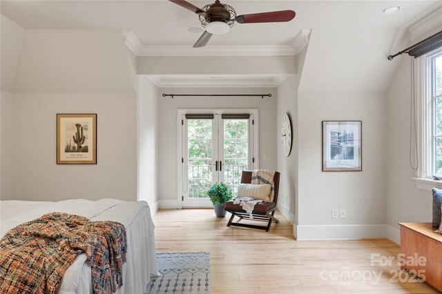 bedroom featuring access to exterior, multiple windows, light wood-type flooring, baseboards, and crown molding