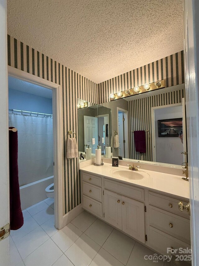 504 Johnsfield Rd, Shelby, NC 28150 - full bath featuring wallpapered walls, a textured ceiling, vanity, tile patterned flooring, and toilet