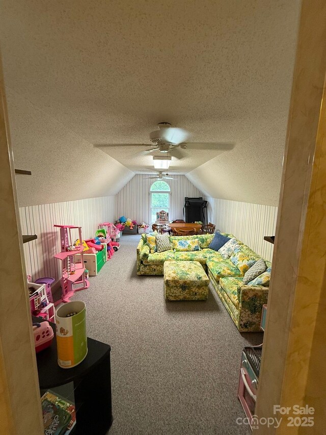 504 Johnsfield Rd, Shelby, NC 28150 - recreation room with a textured ceiling, vaulted ceiling, ceiling fan, and carpet flooring