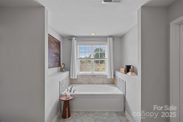 10906 Charmont Pl, Huntersville, NC 28078 - bathroom featuring a bath and baseboards